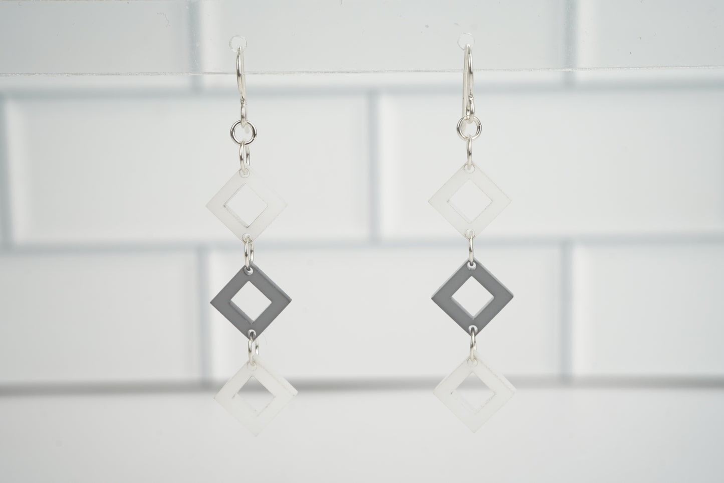 Diamond Cutout Dangle Earrings- Black and White